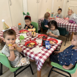 Enjoying yummy party snacks!