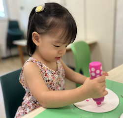 Maya doing some dot stamping!