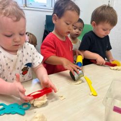 Rown, Johnny and Arthur engaging in some cloud dough play :)