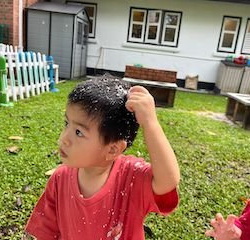 Wesley having fun with artificial snow!