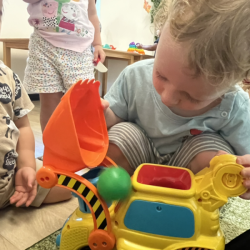 Arthur figuring out how trucks work!