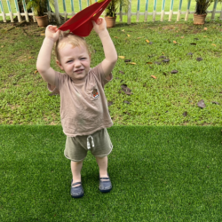 Arthur flying his paper plane!
