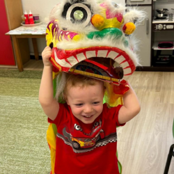 Arthur having fun with the lion dance costume!