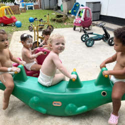 Arthur having some see saw fun with Alba and Amara!
