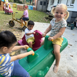 Eleanor and Daniel enjoying the mini see saw!
