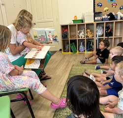 Everyone listening attentively to the stroy.