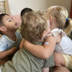 Group cuddle time to show how we give love to each other like the pink monster in the book!