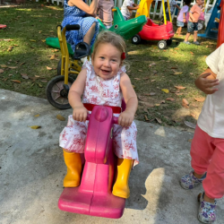 Livvy loves going on the rocking horse!