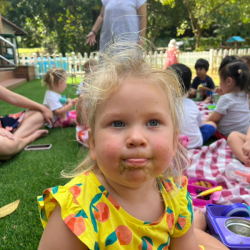 Olivia enjoying picnic outdoors!