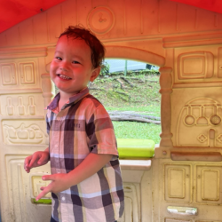 Rowan enjoying playing hide and seek with his friends!