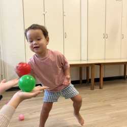 Rowan practising over arm throw with balls