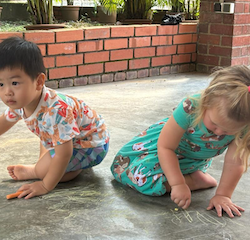 Wesley and Olivia doing some chalk drawing!