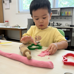 Wesley making a snake!