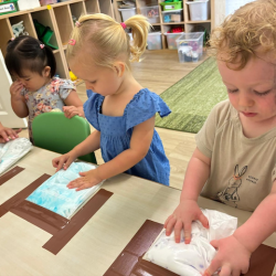 Arthur and Eleanor having fun with ocean sensory bags looking for sea creatures!