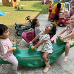 Cara, Kai and Eleanor having fun outdoors
