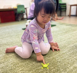 Celene having a go at leap frogs!