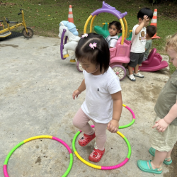 Celene jumping through hoops!