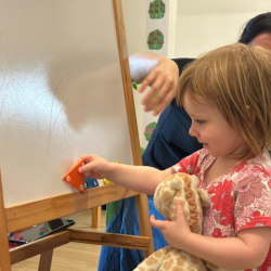 Edwina learning about triangles in Mandarin class!