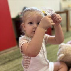 Eleanor learning about letter sound ‘m’ objects - money!