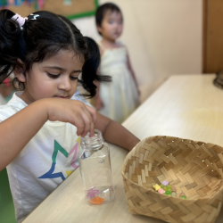 Kai making a sensory bottle!