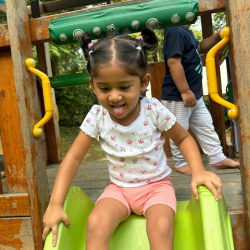 Nysha going on the big slide!