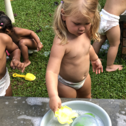 Olivia having fun with some water play!