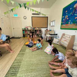 The Sunbirds enjoying the story about a dirty dino!  Thank you Tina for the lovely story!